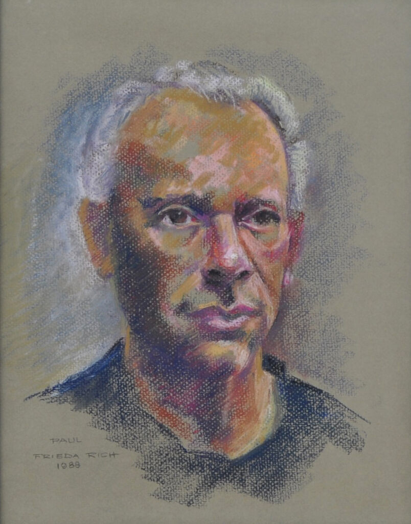 Portrait of Paul F. Johnson, a white man with white, receding hair, and a black shirt.