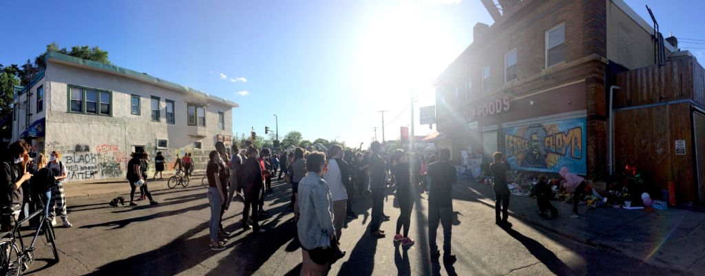 A crowd gathers at the George Floyd memorial in south Minneapolis. Photo credit: Sophie Hunt